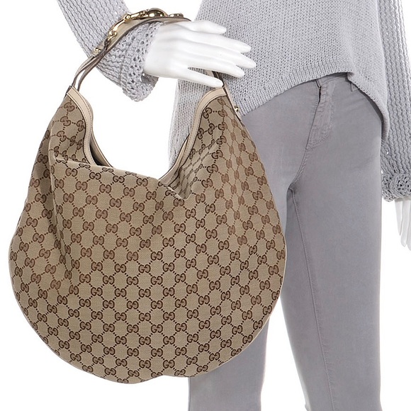 Gucci Handbags - Gucci Wave Canvas Hobo Bag
